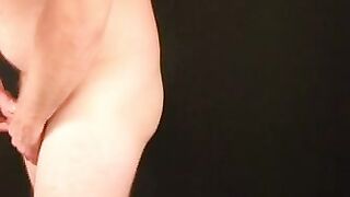 Older gay dude strokes his cock and covers himself with cum