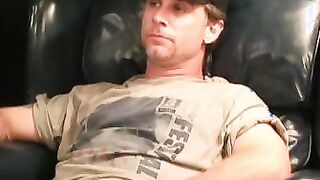 Older gay dude strokes his cock and covers himself with cum