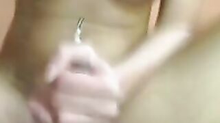 Busty Babe dildoes her wet pussy with a toy