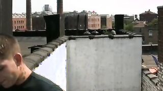 Handsome young man jacking off cock in rooftop solo session