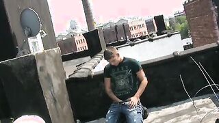 Handsome young man jacking off cock in rooftop solo session