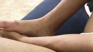 Ebony twink loves to play with his feet and masturbate