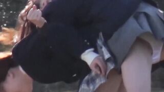 Japanese chicks in school uniform pee on the bench outside