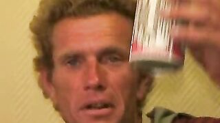 Mature dude strokes his massive cock while smoking a cigar
