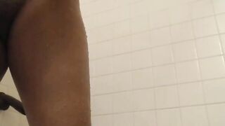 Horny Ebony rides her dildo in the shower