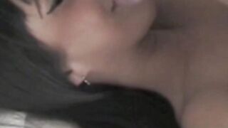 English chick with piercing smiles as she strokes a dick