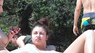 Young nudist girl displays her natural perky tits