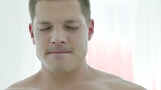 Athletic twink Sean White wanking uncut big dick in bedroom