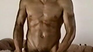 Kinky retro black stallion masturbates his rock hard cock