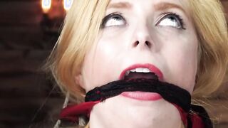 Big tits slave tied to a wooden column and whipped