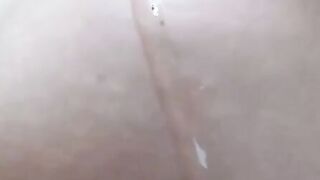 Hot Chick having fun oiling herself up