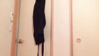 Naughty Japanese teen pees in a cup while putting makeup on