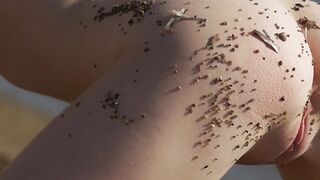 Serena J who is stunning teases the public outside with her shaved pussy