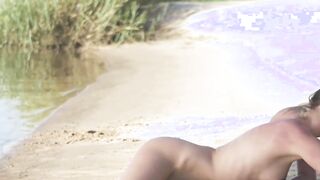 Natalia an exotic cutie having fun on a sandy beach