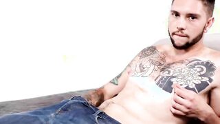 Young inked cutie working on his sweet cock really hard