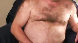 Bearded mature bear plays with his fat shaft and shoots cum
