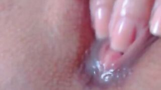 Horny Babe fingers her wet pussy upclose