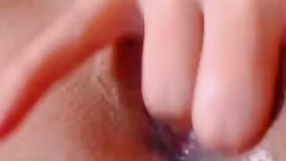 Horny Babe fingers her wet pussy upclose