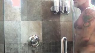 Tattooed bear pounding bottom jock raw after shower blowjob