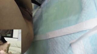 Oriental woman recorded peeing and getting her pussy cleaned