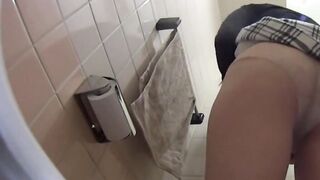 Japanese woman shot while peeing with stowed away cam