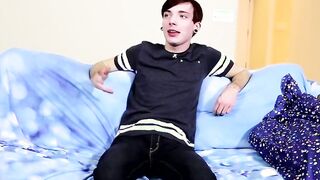 Twink is being interrogated before being made to stroke vigorously