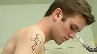 Athletic guy Bryce Corbin wanking his big cock in the shower
