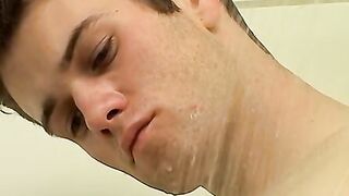 Athletic guy Bryce Corbin wanking his big cock in the shower