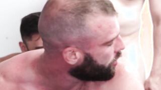 After juicy blowjobs hot studs engage in an intense bareback threesome