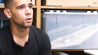 A security guard kicks a young Latino shoplifter in the ass