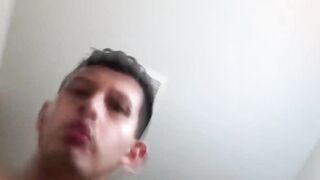 Petite Latino gay Roman Blake jerks off his load into hand