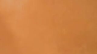 Handsome guy wanking his wet cock while showering in undies