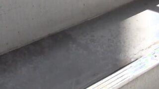 Perfect Oriental minx spilling pee on flight of stairs