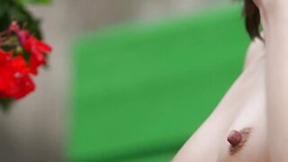 The natural tits and shaved pussy of Sabrina G are displayed outdoors