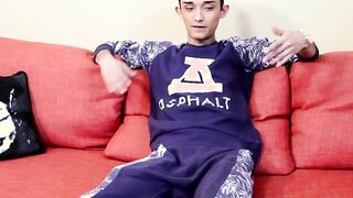 Twink masturbates while flaunting his ass and cock