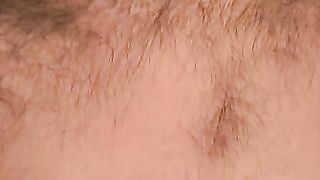 Hairy mature guy pulls out his dick on the sofa and comes