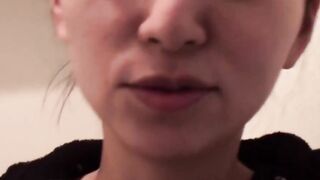 Japanese cutie fills a cup up with her pee and records it