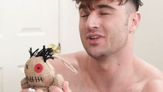 Bald guy teases himself while being controlled with a doll