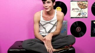 Young gay Christian Collins cums hard after stroking cock