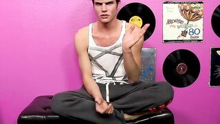 Young gay Christian Collins cums hard after stroking cock