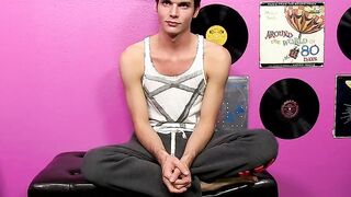 Young gay Christian Collins cums hard after stroking cock