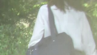Japanese lady finds a secluded place to pee in public space