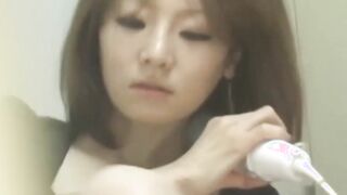 Japanese cutie masturbates with vibrator on hidden camera