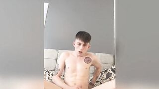 Inked twink Arron Myers jerking off during solo anal play