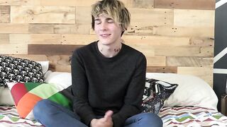 Good looking twink has an interview and jerks it off solo