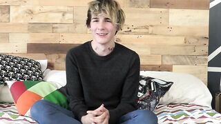 Good looking twink has an interview and jerks it off solo