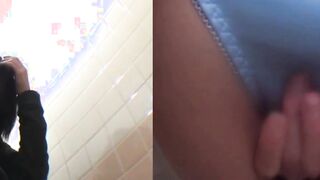 Horny Japanese teen fingers her pussy on hidden toilet cam