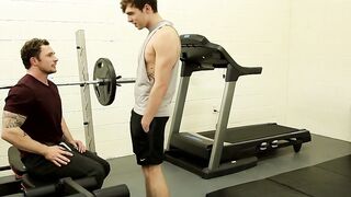 Tattooed hunk fucking this skinny dude in the ass at the gym
