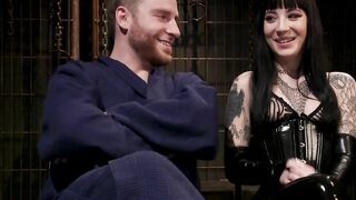 Vicious tattooed femdom torments bound man