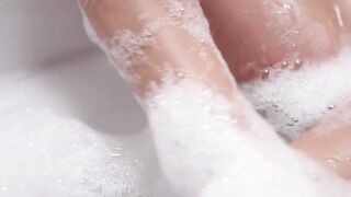 While engaging in sensual solo pussy play a natural tits beauty moans